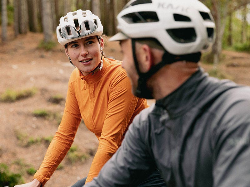 Two cyclists chatting during the ride