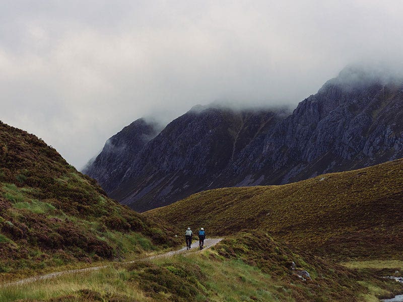 Cyclists riding into the distance