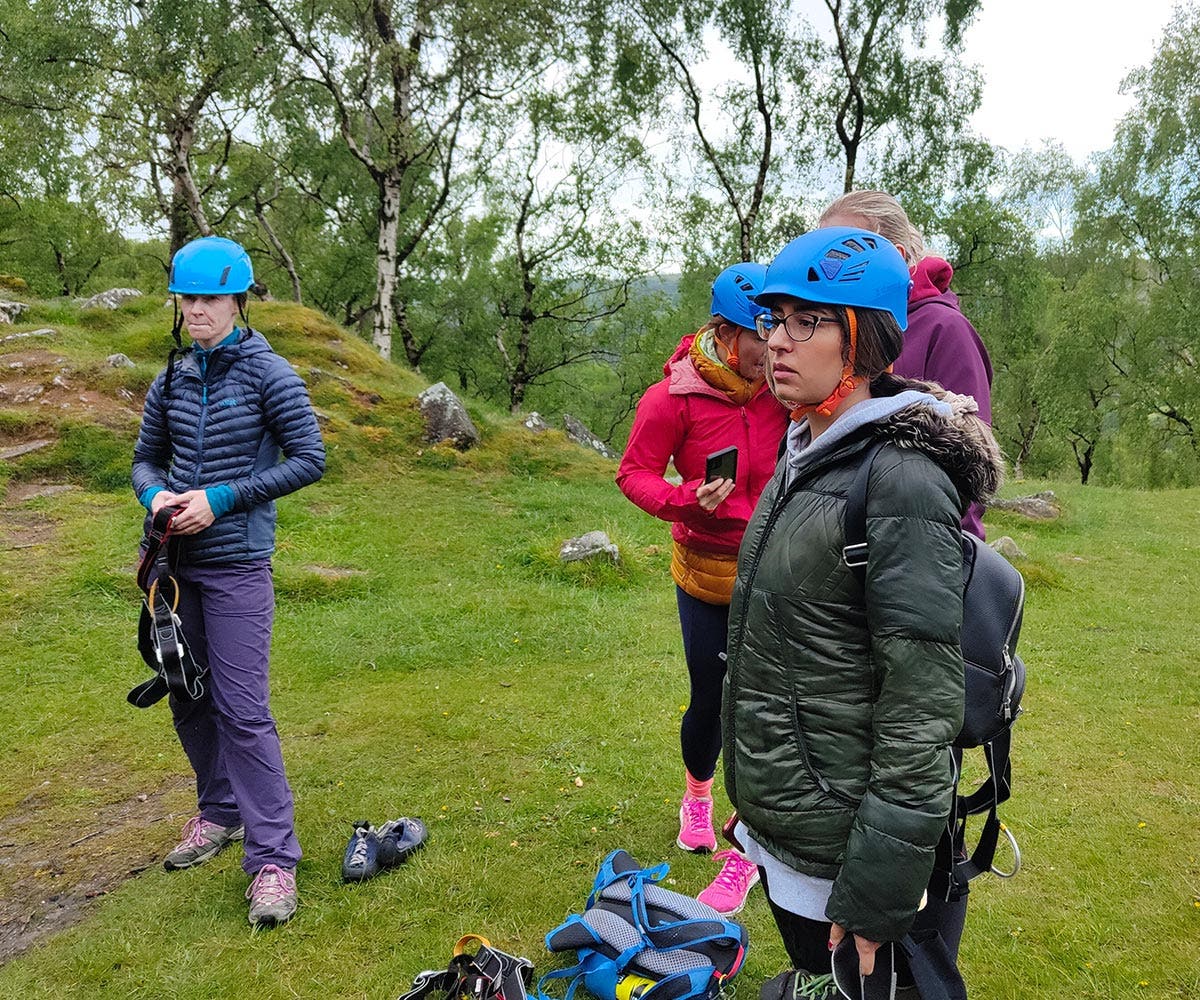 Rab employees learning climbing, whilst clearing little from the peak district