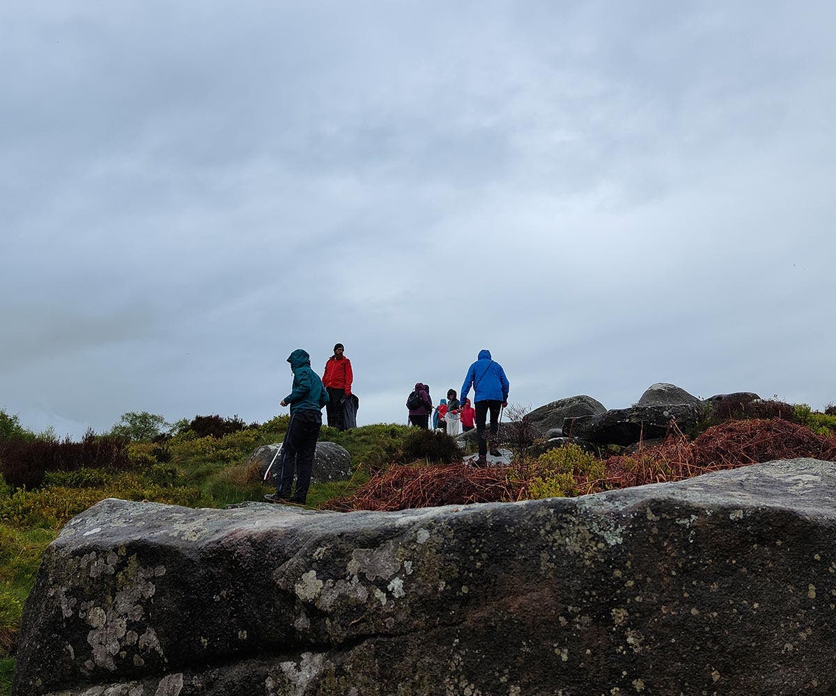 Rab employees learning climbing, whilst clearing little from the peak district