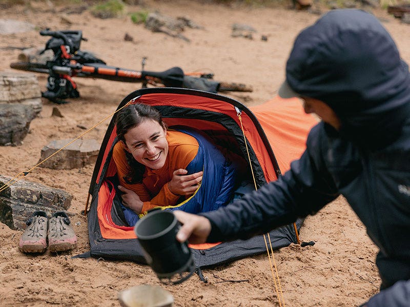 Two cycles resting in their camp